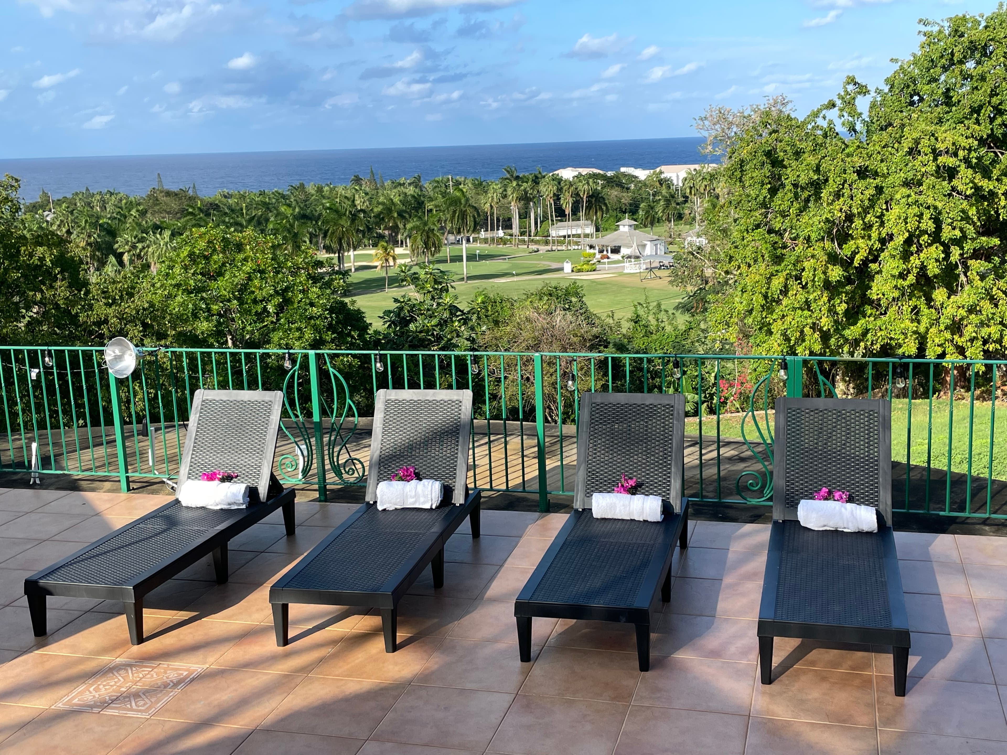 Sweet Dreams Villa terrace lounge chairs overlooking the ocean